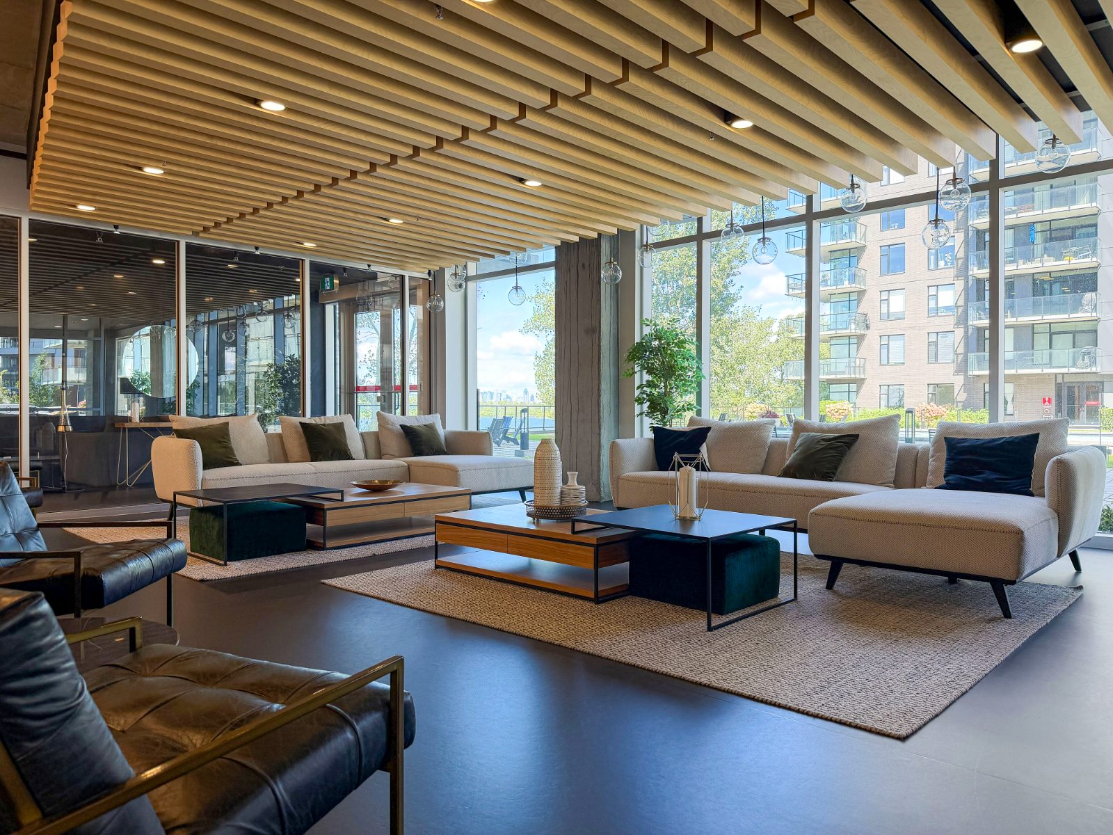 LUM Pur Fleuve lobby with wood-slat ceiling and lounges facing the river